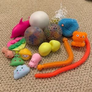 17 piece set of squishes, stress balls, and fidget toys!